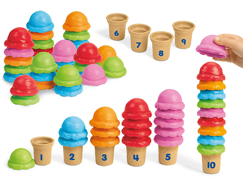 Colorful plastic ice cream scoops stacked in numbered cones from 1 to 10. 