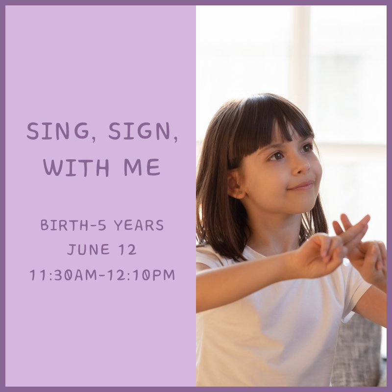 A child speaking in sign language.
