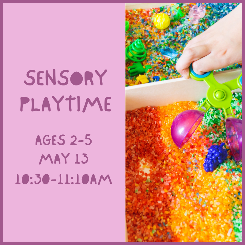 A child playing in a sensory bin.